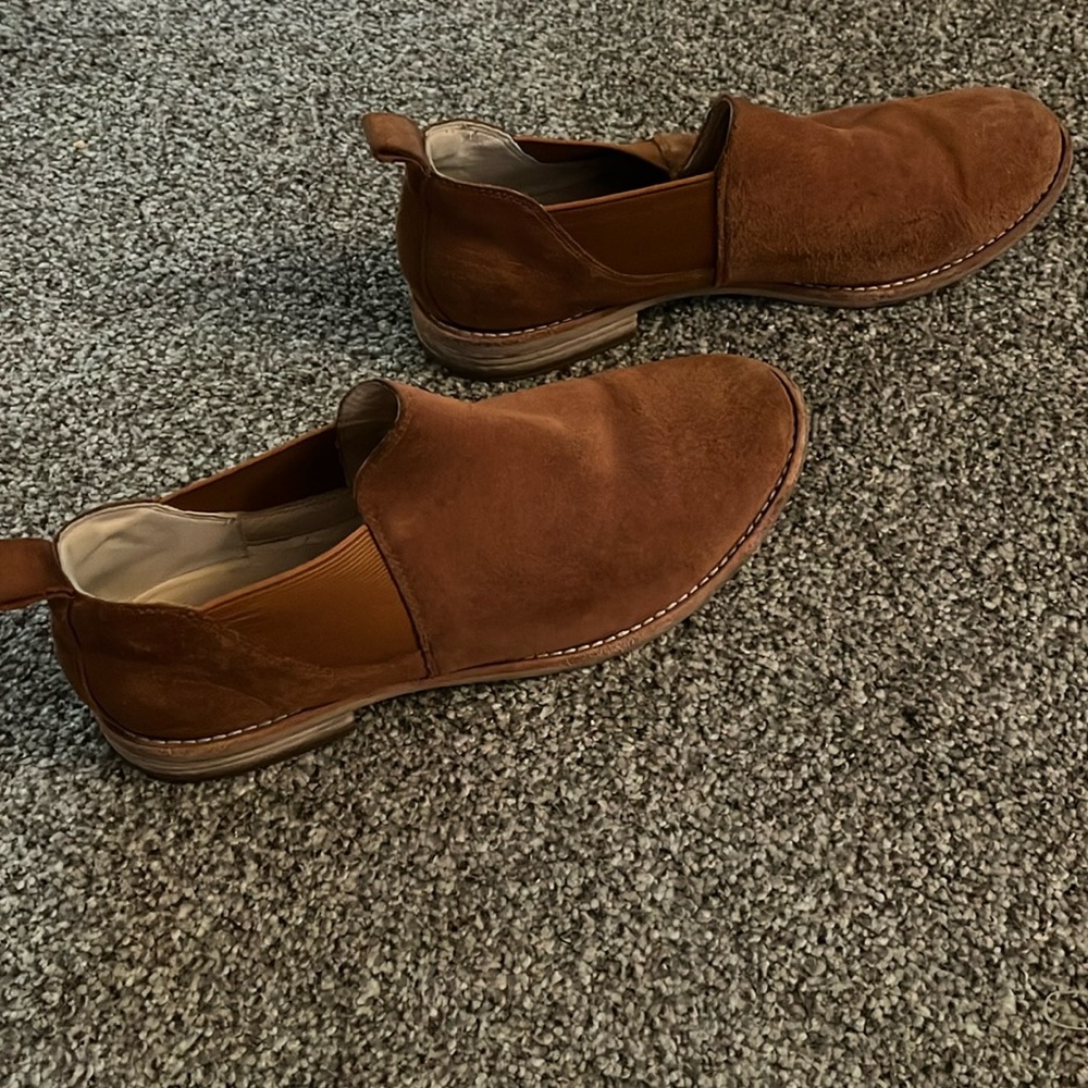 Brown Clark slip ons